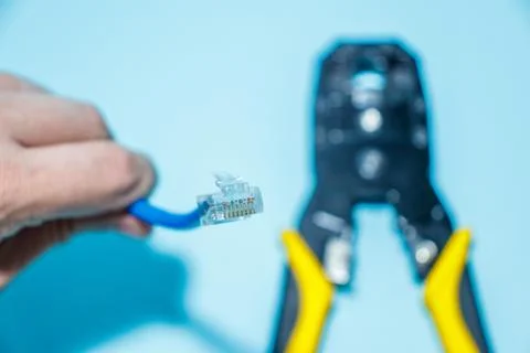 Twisting Cable Tool Twisted Pair Ethernet UTP Cat 5, Crimping RJ45 LAN cable, Stock Photos