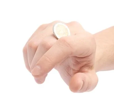 Twisting coin with the knuckles Stock Photos
