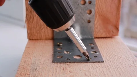 Twisting the screw by screwdriver Stock Footage 104430419