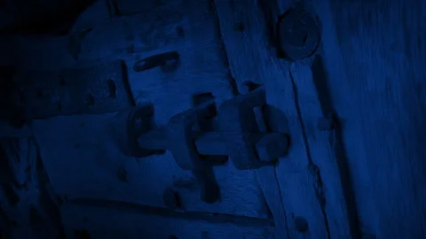 Twisting Shadows Over Locked Castle Door At Night Stock Footage 296701013