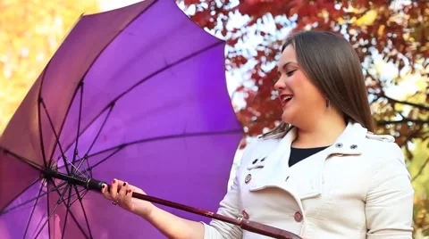 Twisting umbrella Stock Footage 42779509