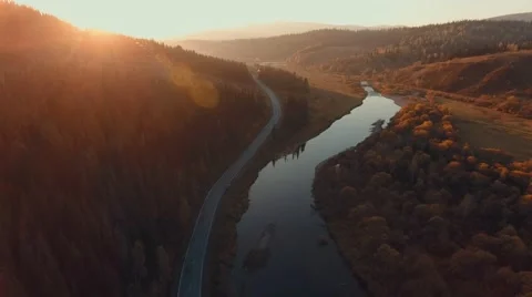 Twisty riverbed. The road parallel to the river. Amazing places Stock Footage 68357926