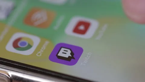 Twitch icon typing and scroll. Close up shot of hand on social network. Macro Stock Footage 170562388