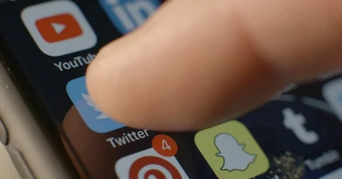 Twitter app on Iphone 8 macro slow motion Stock Footage 84634208