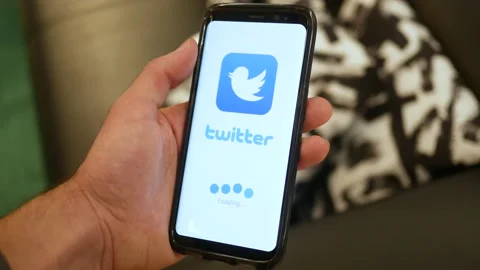 Twitter app Loading on a Smartphone Screen Stock Footage 144035397