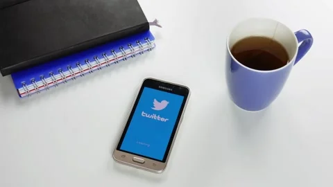 The Twitter application is loaded for a very long time Stock Footage 99836116