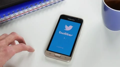 The Twitter application takes a very long time to load Stock Footage 99836194
