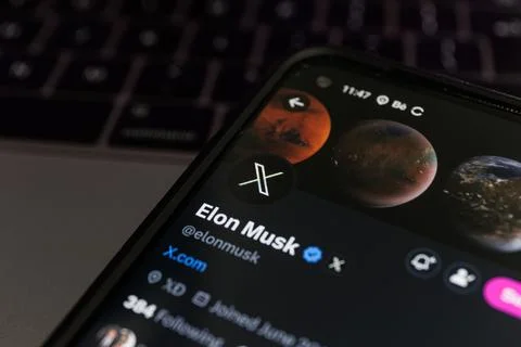 Twitter changes name to X. Elon Musk twitter account. Stock Photos