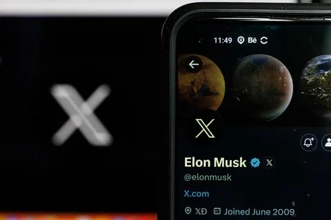 Twitter changes name to X. Elon Musk twitter account. Stock Photos