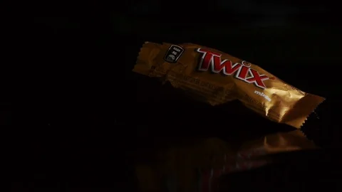 Twix minis cookie bars on black background. Stock Footage 112325674