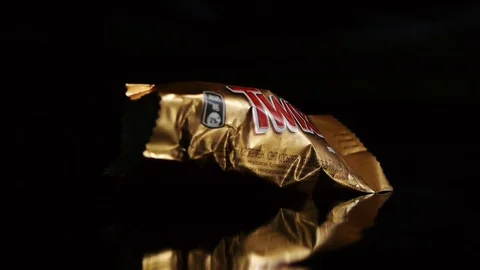 Twix minis cookie bars on black background. Stock Footage 112325680