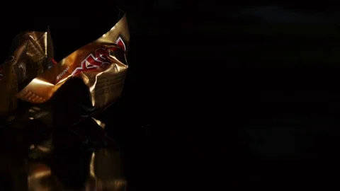 Twix minis cookie bars on black background. Stock Footage 112325684
