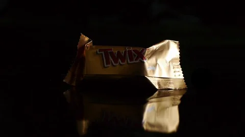 Twix minis cookie bars on black background. Stock Footage 113153286