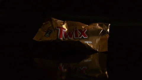 Twix minis cookie bars on black background. Stock Footage 113153297