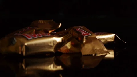 Twix minis cookie bars on black background. Stock-Footage 114065767