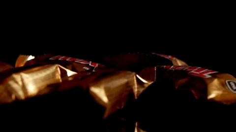Twix minis cookie bars on black background. Stock-Footage 114065771