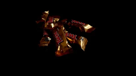 Twix minis cookie bars on black background. Stock-Footage 114065776