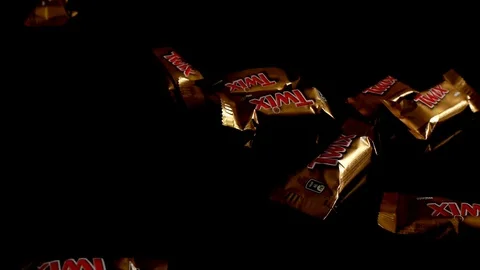 Twix minis cookie bars on black background. Stock-Footage 114065786