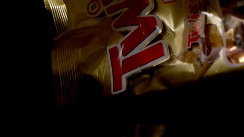 Twix minis cookie bars on black background. Stock-Footage 114065789