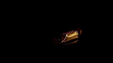 Twix minis cookie bars on black background. Stock-Footage 114065812