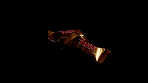 Twix minis cookie bars on black background. Stock-Footage 114065826