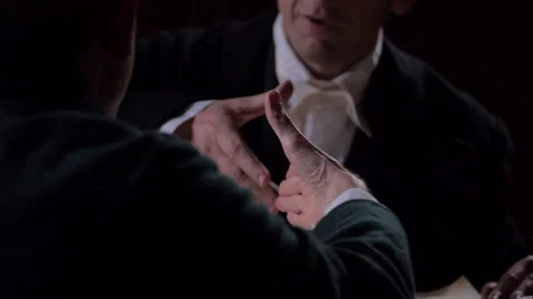 Two 19th Century Men Shake Hands at a historical Tabletop - Priest / Politician Stock Footage 221449368