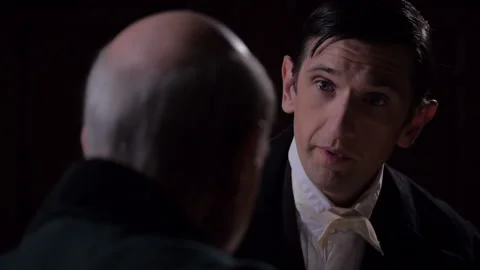 Two 19th Century Men speaking across a historical Tabletop - Politician / Priest Stock Footage 221449352