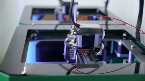 Two 3D printers creating objects Stock Footage 68142337