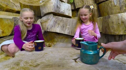 Two 7-10 years old girl drinking milk 库存影片 50649941