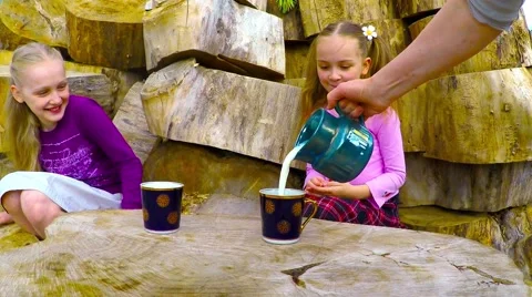 Two 7-10 years old girl drinking milk Video stock 50649970