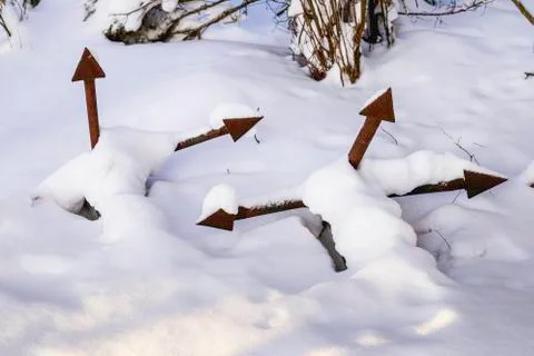 Two abandoned anchors snow covered Stock Photos