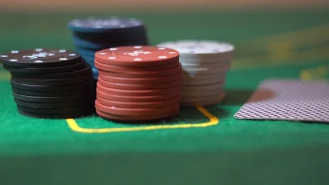 Two Aces Close Up, Poker Cards In Player Hand, Stack Of Chips On Casino Table Stock Footage 90494735