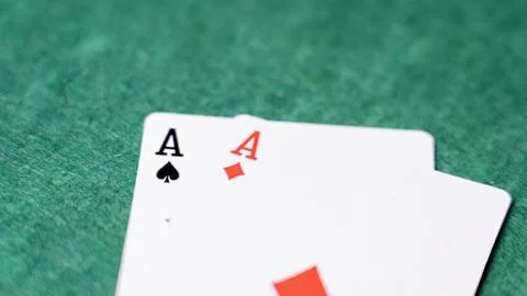 Two aces lie overlapping Stock Photos