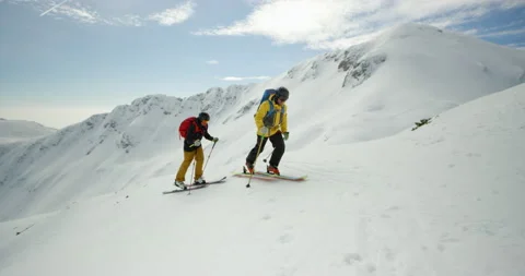 Two Active Men Hiking In The Snow Stock Footage 140193606