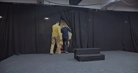 Two Actors Exit Stage After Theatre Rehearsal: Preparing for the Performance Stock Footage 312072482