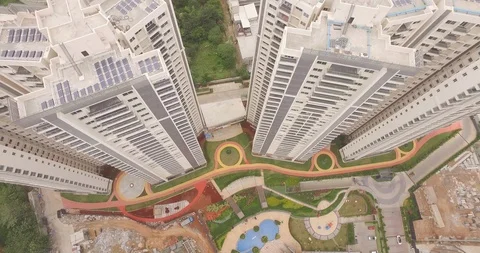 Two adjacent Sky Scrapers - bird eye view track down Shot on DJI Drone 動画素材 90757546