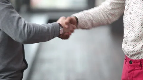 Two advertising executives shaking hands Stock Footage 59543465