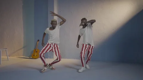 Two African Boys Dancing Hard to Lingala Music – Studio Shot 스톡 동영상 315577801