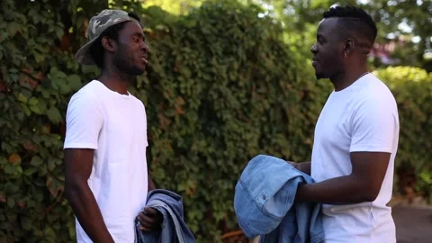 Two African friends communicate with each other Stock Footage 140842446