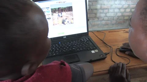 Two African Students Using Computer In A Class In Rwanda Stock Footage 53160327