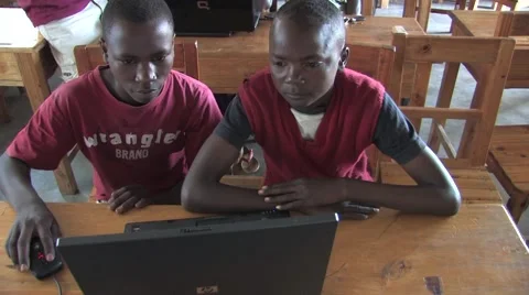 Two African Students Using Computer In A Class In Rwanda Stock Footage 53168456