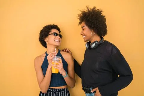 Two Afro friends having fun together. Stock Photos