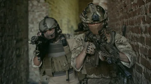 Two air soft man to inspect urban territory. Tactics rules Stock Footage 127884104