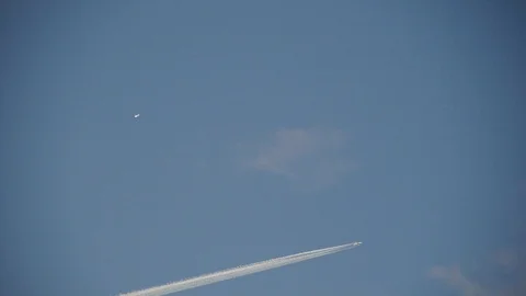 Two airliners on blue sky Stock Footage 91900559