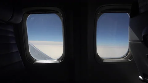 Two Airplane windows during the flight. Stock Footage 144212601