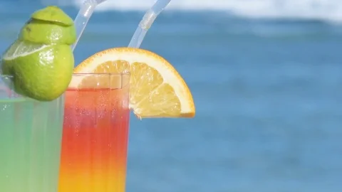 Two alcoholic cocktail on the background of the sea. Stock Footage 83211228