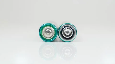 Two alkaline batteries on a white background with reflection. Energy supply a Stock Photos