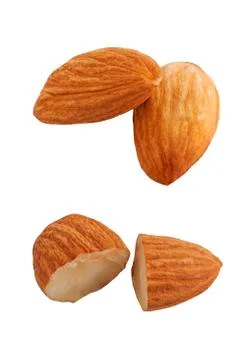 Two almond nut half cut isolated on white Stock Photos