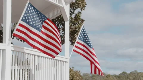 Two American Flags on Gazebo Blowing in Breeze Video stock 133018809