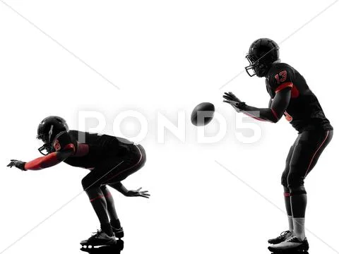 Two american football players on scrimmage silhouette Stock Photos